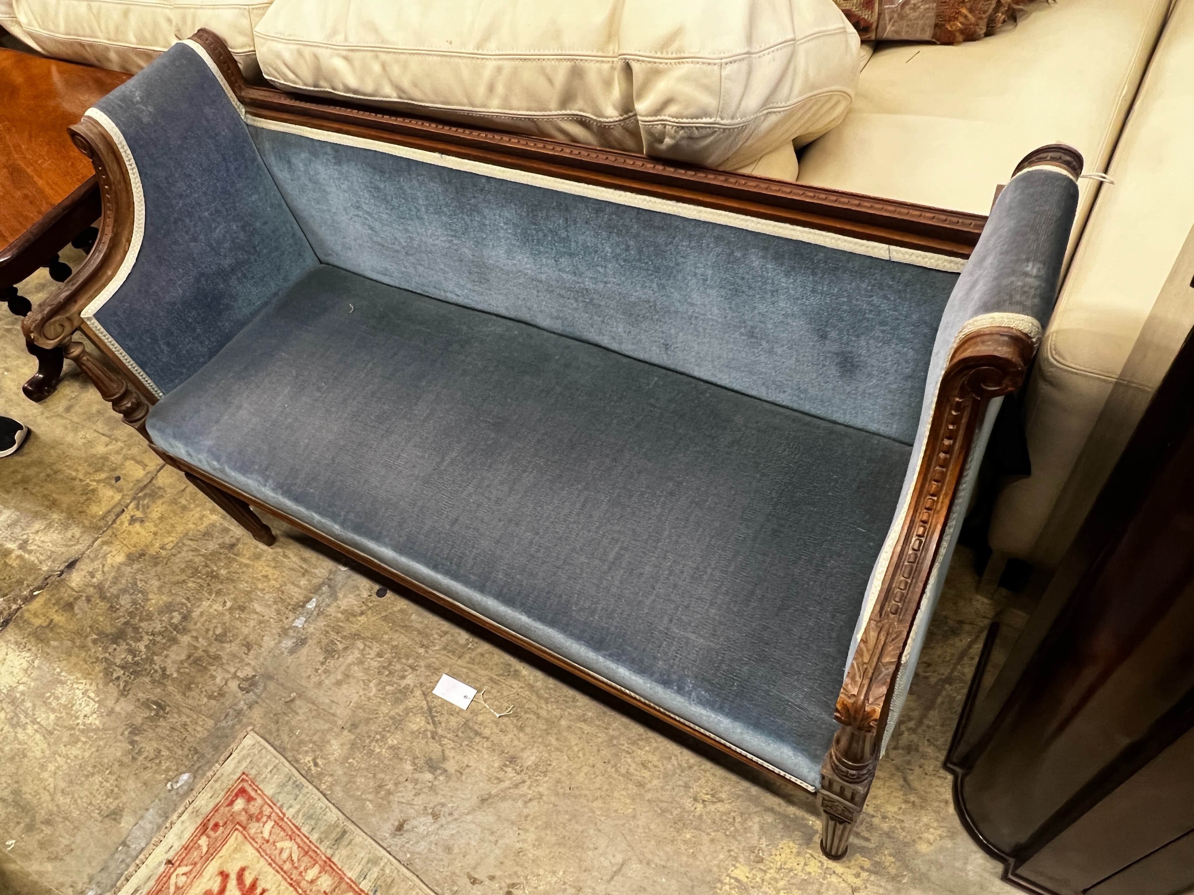 A late 19th century French upholstered carved beech settee, length 120cm, width 47cm, height 79cm